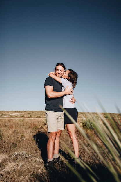 Couple hiking together in the wilderness