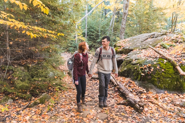 Couple hiking in the woods in Canada