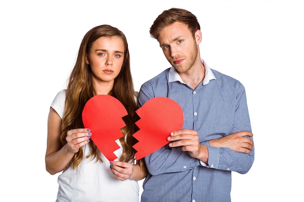 Couple holding broken heart