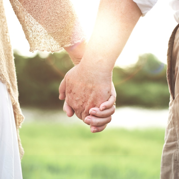 Couple holding hands