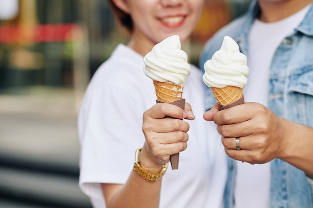 Couple Holding Ice Cream Cones