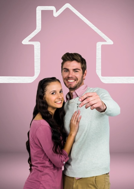 Couple Holding key with house icon in front of vignette