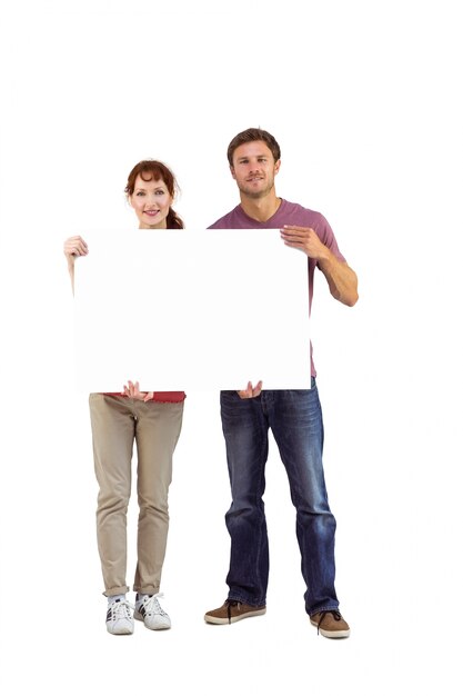 Photo couple holding a white sign