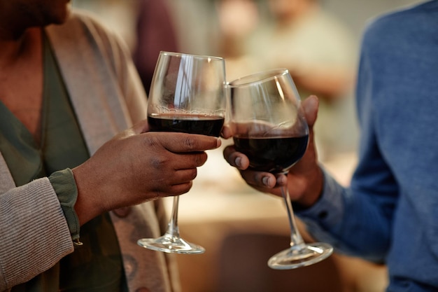 Couple Holding Wine Glasses