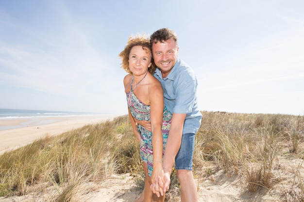 Couple hug on beach