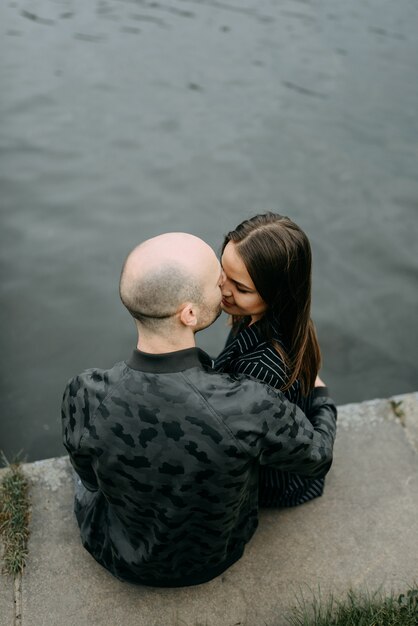 Couple hugging on a pier