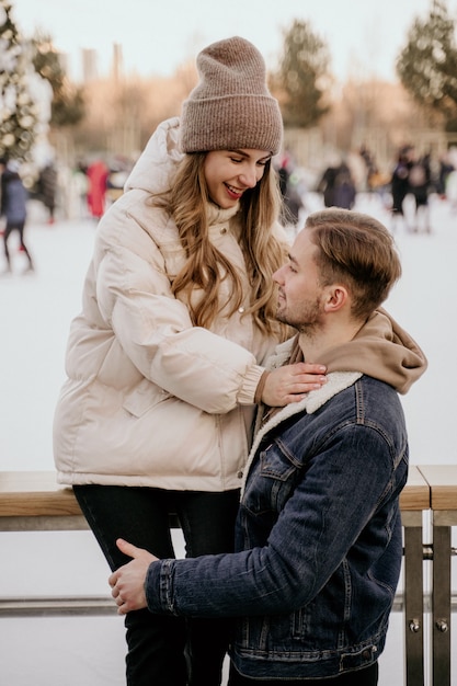 Couple at ice skating rink