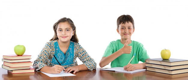 Couple of kids students isolated over white