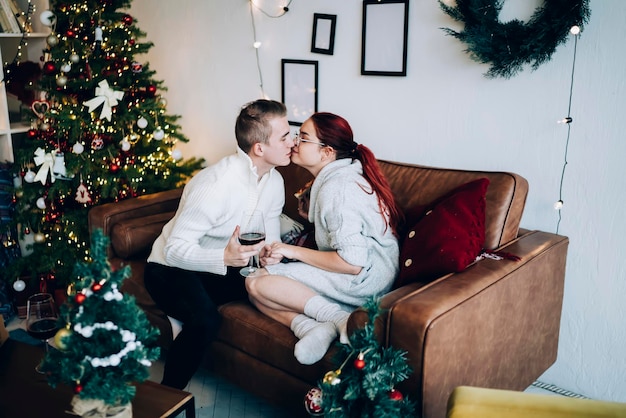 Couple kissing on Christmas eve