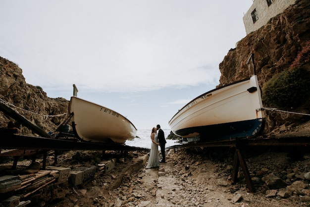 Couple kissing at sea