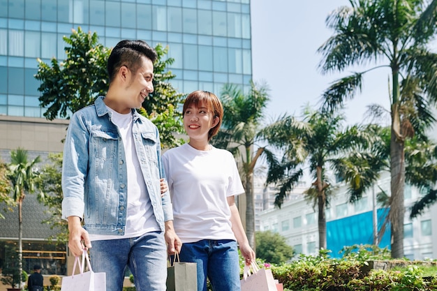 Couple leaving shopping mall