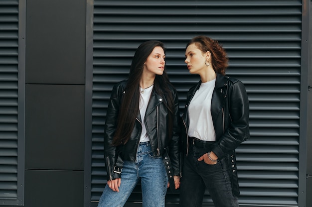 Couple of lesbian girls in stylish clothes