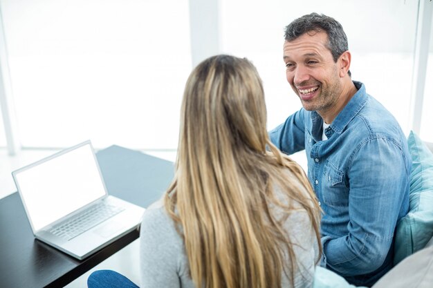 Couple looking at each other and smiling