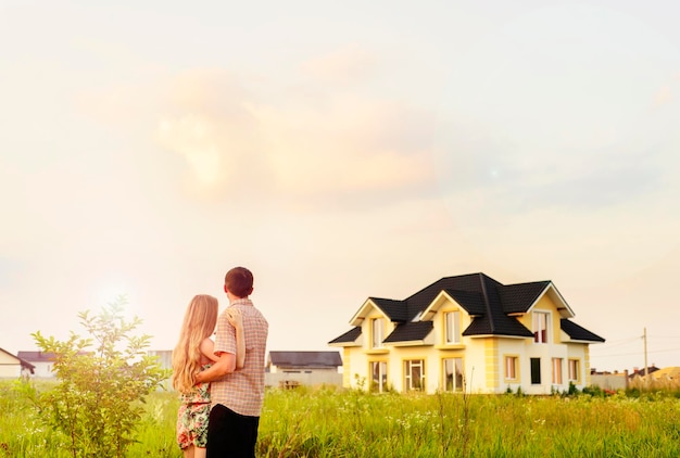 Couple looking on house