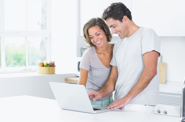 Couple looking at laptop