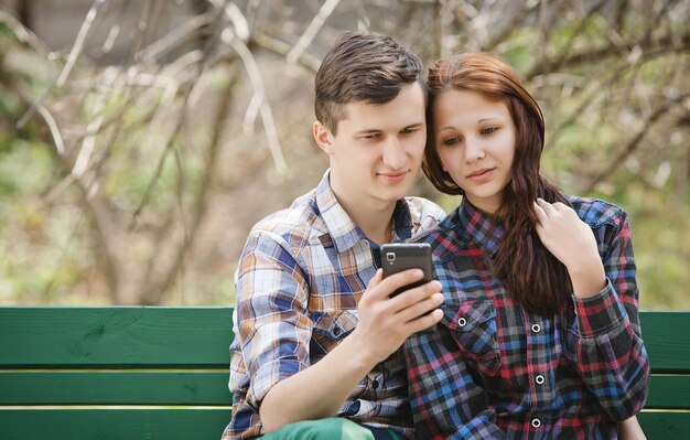 Couple looking at mobile phone