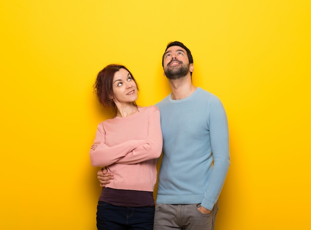 Couple looking up while smiling