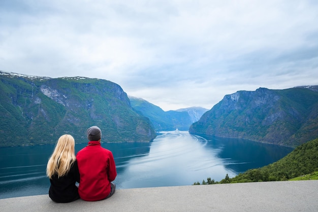 Couple looks at the Sognefjord fjord