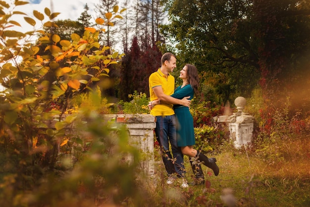 Couple in love in ancient retro place in autumn