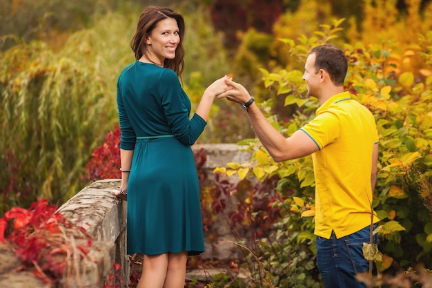 Couple in love in ancient retro place in autumn