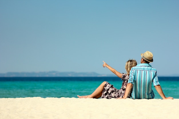 Couple in love on the beach in summer