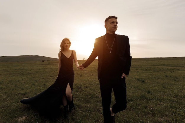 couple in love in black dress and suit