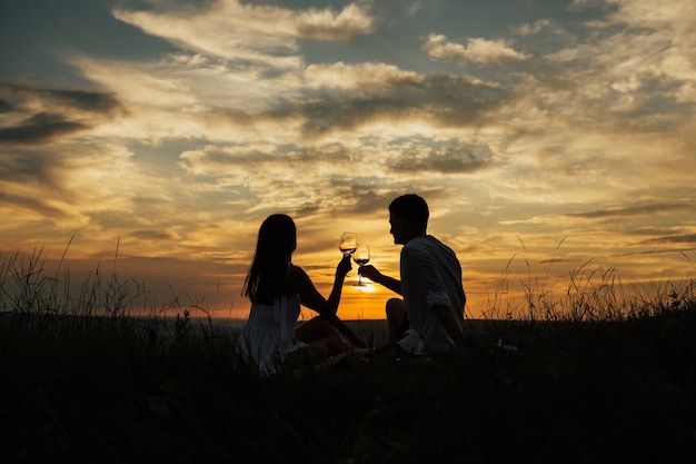 Couple in love drinking champagne and celebrating their love