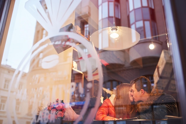 Couple in love drinking coffee in cafe