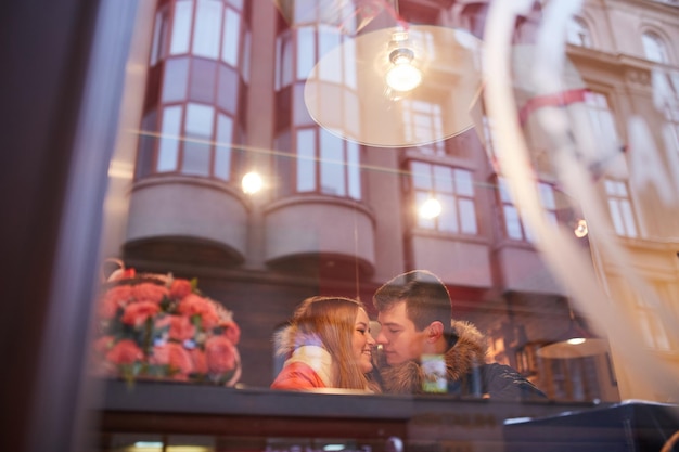 Couple in love drinking coffee in cafe