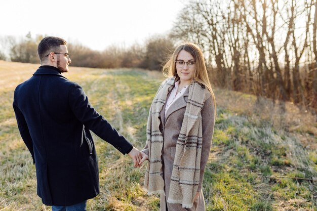 Couple in love enjoying a walk on a sunny spring day