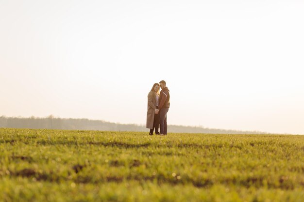 Couple in love enjoying a walk on a sunny spring day