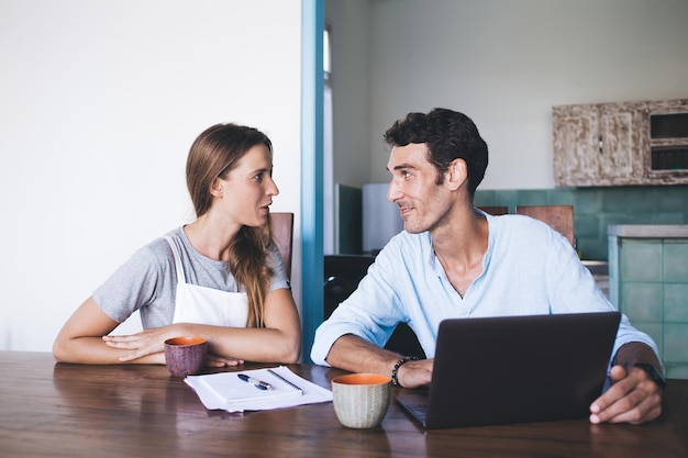 Couple in love having conversation at home