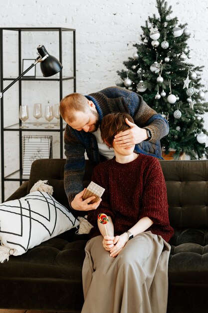 couple in love at home on Christmas time