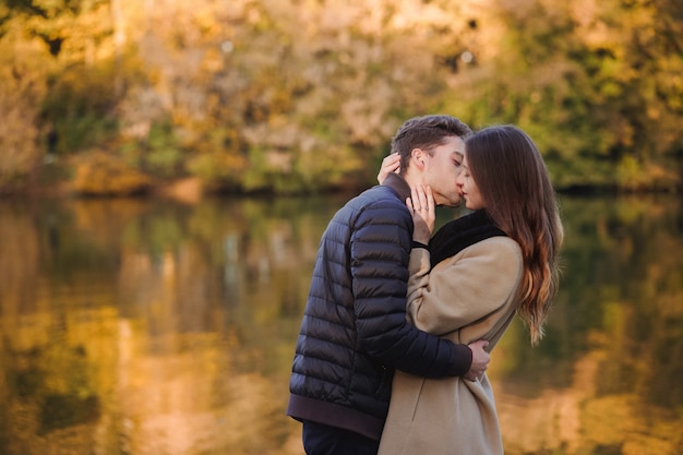 Couple in love hugging outdoors