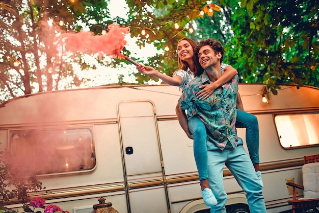 Couple in love near trailer