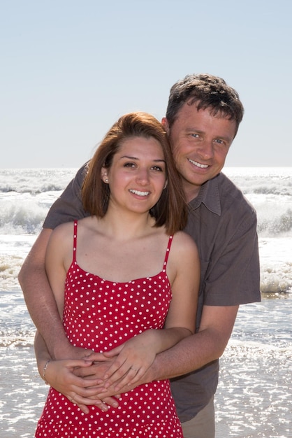 Couple in love outdoor posing in summer