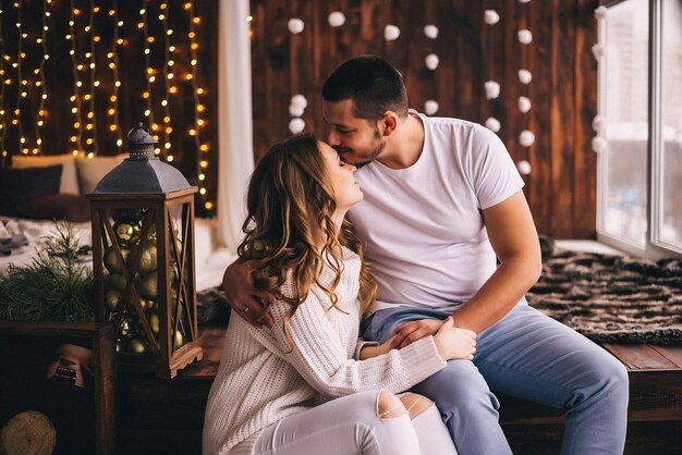 Couple in love packing christmas gifts. Newyear