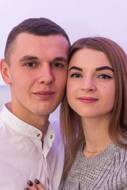 Photo couple in love posing hugging. valentines day. passion and feelings between young people