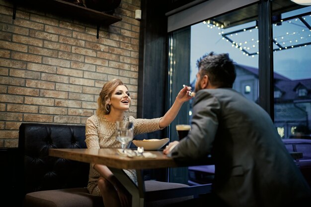 Couple in love at the restaurant couple in love eating at romantic date