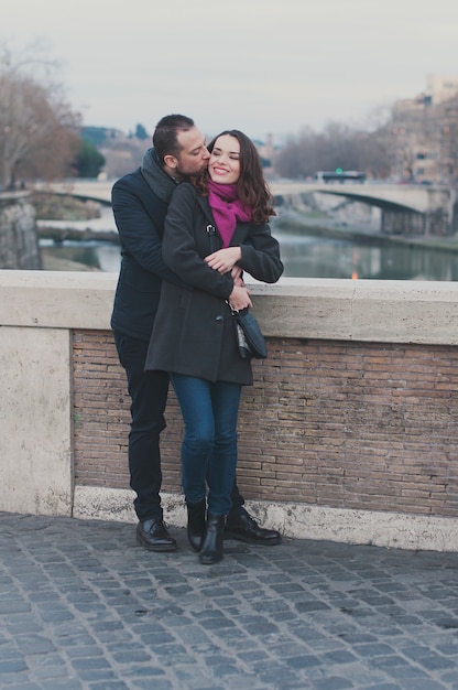 Couple in love walking in Rome