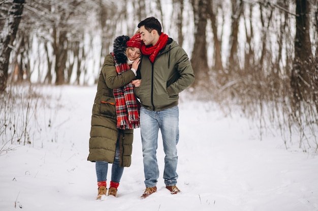 Couple in love walking in winter park