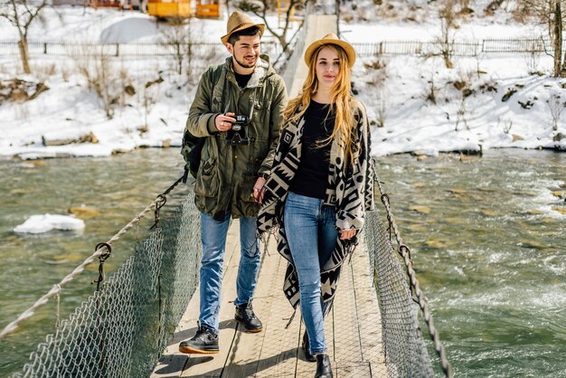 Couple in love on winter vacation in the mountains