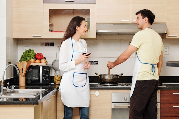 Couple making dinner together