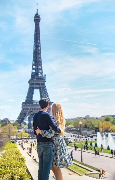 Couple man and woman near the eiffel tower Selective focus