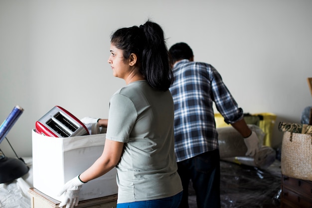 Couple moving into a new house