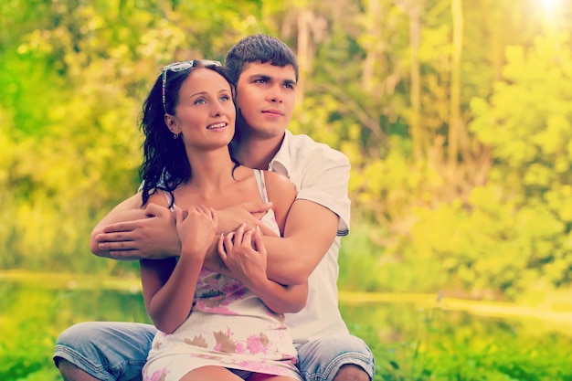 Couple on nature looking in a distance instagram color