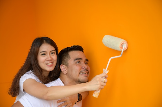 Couple painting the wall, lovely concept