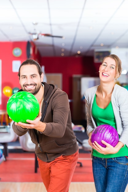 Couple playing Bowling