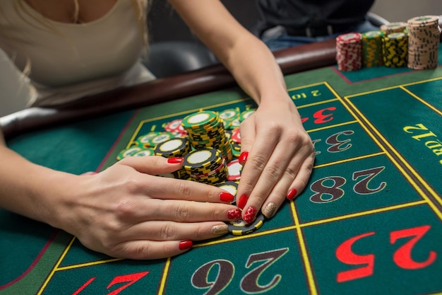 Couple playing roulette wins at the casino