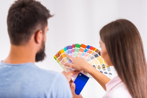 Couple preparing for a repair in the new home.